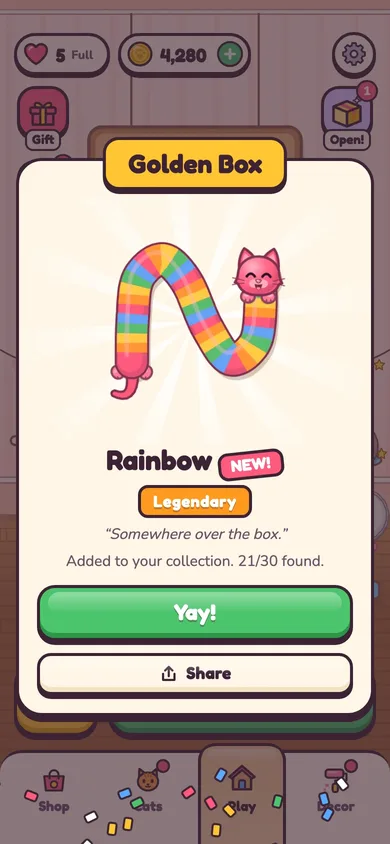 Golden box reveal of a rainbow cat